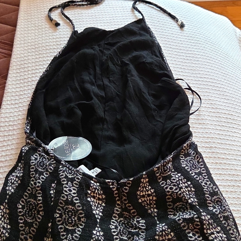 Stylish Black and White Leg Wrap Around Backless Jumpsuit - Picture 9 of 11